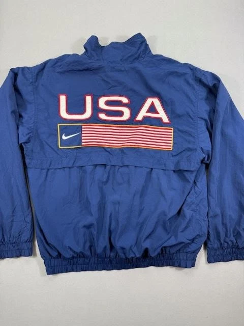 Chaqueta cortavientos Nike azul pequeña vintage de atletismo de EE. UU. para hombre cremallera completa años 90 Foto 1 de 4