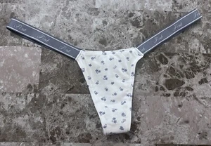 NWT VICTORIA'S SECRET PINK BLUE FLORAL MICRO TINY LOGO SIDE STRAPS THONG PANTIES - Picture 1 of 3
