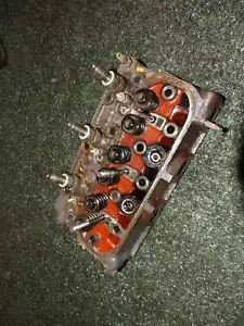 Kubota BX1800 HST D722 Cylinder Head w/ Nozzles H1600-53000 - Picture 1 of 5