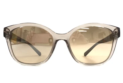 Gafas de sol Armani Exchange AX4127Q 82408Z transparentes azules con marrón degradado Foto 1 de 4