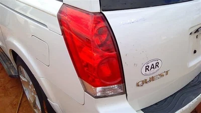 Lente roja montada en un cuarto de luz trasera del conductor para Nissan Quest 04-09 OEM Foto 1 de 4