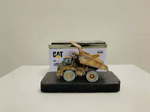 Camion fuoristrada Cat 772 edizione fangosa scala 1:87 HO DieCast Masters 85261 - Foto 1 di 8