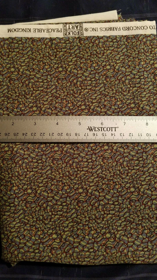 Green Fabric with 'rock' theme red/black outline--1 Yd. + 21" - Image 1 of 1