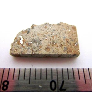 Fragmento de meteorito Oued el Hadjar - 0,67 gramos LL6 caída de condrita - Marruecos - Imagen 1 de 3