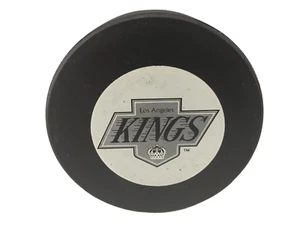 LA KINGS NHL VINTAGE GAME PUCK JOHN A. ZIEGLER TRENCH MFG. - Picture 1 of 2
