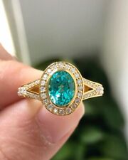 1.50Ct Oval Cut Lab Created Emerald Halo Engagement Ring 14K Yellow Gold Plated