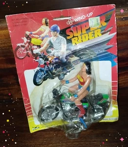 VINTAGE RARE WONDER WOMAN KAWAZAKI MOTORCYCLE SUPER RIDER WIND UP GREEN VARIANT - Picture 1 of 17