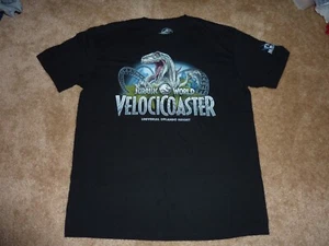 Maglietta grande Jurassic World Velocicoaster Universal Studios membro del team uniforme - Foto 1 di 10