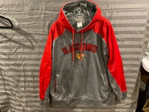 SUDADERA CON CAPUCHA CHICAGO BLACKHAWKS MARCA NHL HOCKEY NEGRA Y ROJA PARA HOMBRE XL - Imagen 1 de 4