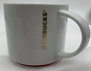 Starbucks Coffee Mug 2012 16oz White W/ Gold Embossed Log & Red Trim - Picture 1 of 6