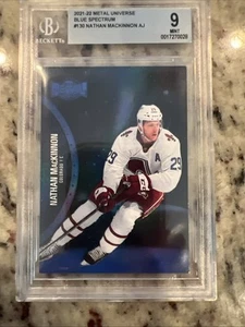 2021-22 SkyboxMetal Universe Alternate Jersey Nathan MacKinnon 130 Blue Spectrum - Picture 1 of 2