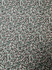 Charleston quilt fabric by Marcus Bros R33-E250-14T tiny brown leaves on green - Picture 1 of 5