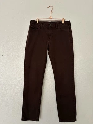 Pantalones de mezclilla Banana Republic Traveler marrón calce ajustado bolsillos elásticos para hombre 32x 30 Foto 1 de 4