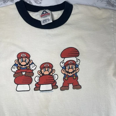 Camiseta De Colección Super Mario Bros Camiseta Blanca Timbre Seta M Amarillenta Foto 1 de 4