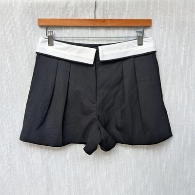 NWT Babaton Bureau Black Mid-rise Wool Twill Pleated Mini Shorts, size 2 - Image 1 of 4