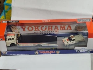 M2 Diecast Yokohama G.T. Special 1957 Mack Model N und 1974 Datsun Truck 1:64 - Bild 1 von 8