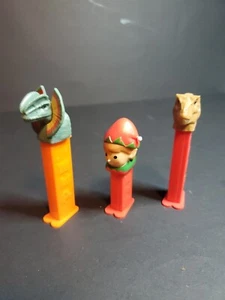 Jurassic Parks/Elf Pez Dispensors (3) - Picture 1 of 3