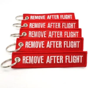 REMOVE AFTER FLIGHT KEYCHAIN QTY= 5 PCS RED/white TAGS FLAGS PILOT CREW - Picture 1 of 3