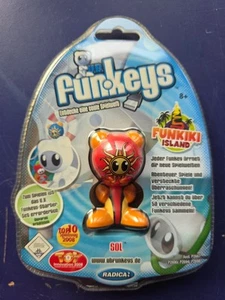 UB FUNKEYS Funkiki Island SOL Red P2694 New OVP MATTEL Radica - Imagen 1 de 3
