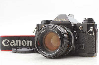 ([Opt NEUWERTIG] Canon AE-1 Program Filmkamera schwarz FD 50mm F1.4 S.S.C Objektiv JAPAN - Bild 1 von 4