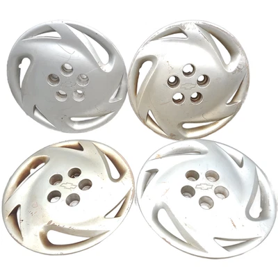 Cubierta de tapacubos de rueda OEM 10172985 (juego de 4) Chevrolet Cavalier 1992-1994 Foto 1 de 4