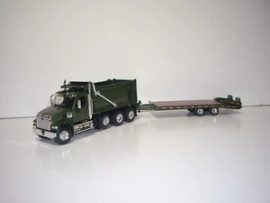 DCP PRIMA MARCIA 1/64 VERDE METALLIZZATO WESTERN STAR 49X SCARICO TRIASSIALE E CODA DI CASTORO - Foto 1 di 12
