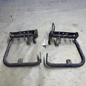 2004,2005,2006,2007,2008,2009 Suzuki LTZ 250 OEM Foot Pegs/Heel Guard Brackets - Picture 1 of 9