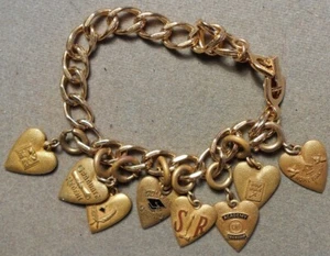 2769 College Bracelet?: Gold plated bracelet with heart shaped charms - Picture 1 of 3
