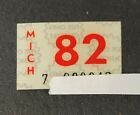 1982 MICHIGAN Nieużywana vintage tablica rejestracyjna NAKLEJKA Rejestracja TAB Tag MI 82