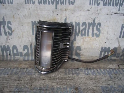 Chrysler Imperial 1969 OEM pasajero delantero derecho luz de estacionamiento luz de giro lámpara Foto 1 de 4