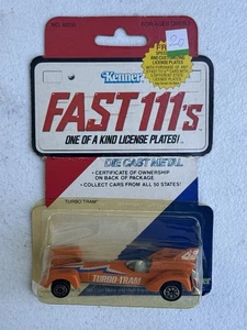 SEALED - 1980 Kenner Fast 111’s Orange Turbo Tram Car Diecast - Bild 1 von 4