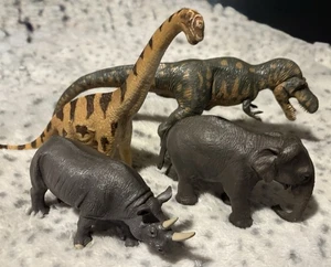 2002 Schleich Brachiosaurus 2004 Elefant + Battat T Rex & Nashorn 4 Stück - Bild 1 von 1