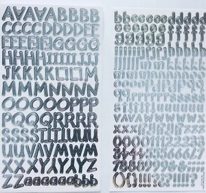Dos hojas pegatinas artesanales de números plateados letras alfabeto álbum de recortes - Imagen 1 de 1