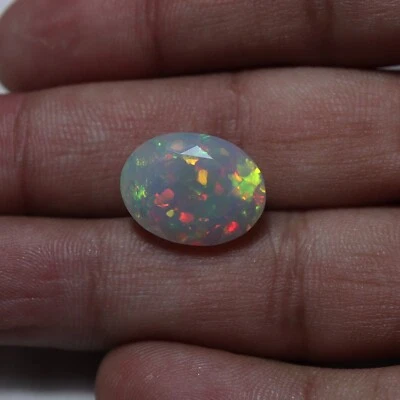 5.8 Cts 16.6x12.6 MM Natural AAA Green Red Fire Ethiopian Opal Oval Cut Gemstone - Image 1 of 4