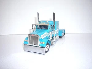 DCP FIRST GEAR 1/64 TEAL WITH STRIPES PETERBILT 379 WITH 48" SLEEPER - Picture 1 of 5