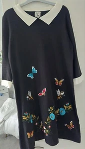 Black dress with colourful flower and butterfly detailing - Picture 1 of 3