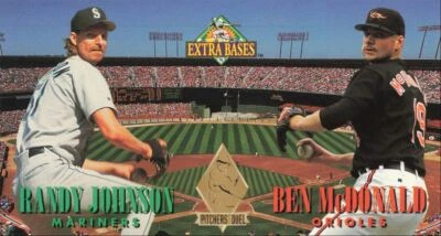 1994 Fleer Extra Bases Pitcher's Duel Randy Johnson / Ben McDonald #M2 - Image 1 of 2