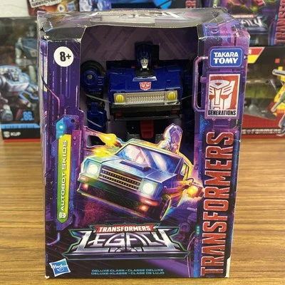 Hasbro Transformers Legacy Deluxe Class Autobot Skids New in Package - Image 1 of 4