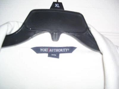 Port Authority | Chaqueta cortavientos colorblock crema y negro SAINTS Foto 1 de 4