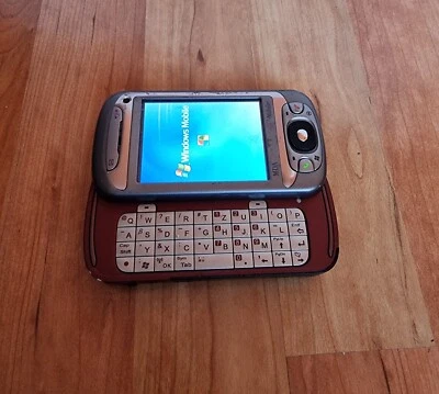 HTC HERMES 300 MDA T- Mobile Slider in silbergrau-rot - Bild 1 von 4