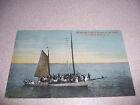 1913 OFF FOR THE FISHING BANKS on THE CARIB at ASBURY PARK NJ. ANTIQUE POSTCARD