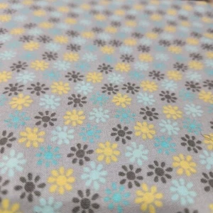 Tessuto da cantiere trapuntato cotone grigio giallo acqua bursts - Foto 1 di 1