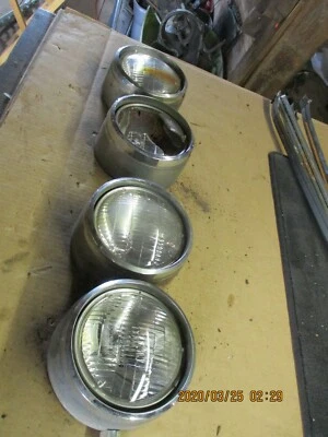 Oldsmobile Starfire 1963 faros luces bisel cubo moldura llanta juego de bombillas Foto 1 de 4