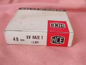 Filtro UV Haze 1 vintage HCE 49mm (L39) - en caja, vidrio limpio, Japón - Imagen 1 de 1