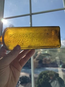 Botella vintage amarilla ámbar DR. J HOSTETTER’S SMAM BITTERS - Imagen 1 de 8