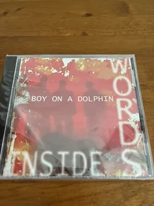 Junge auf einem Delphin, Worte im Inneren CD NEU - Bild 1 von 3