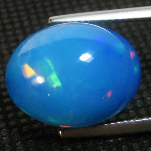 9.75Cts Natural Color Play Ethiopian Blue Opal Oval Cabochon Loose Gem - Picture 1 of 5