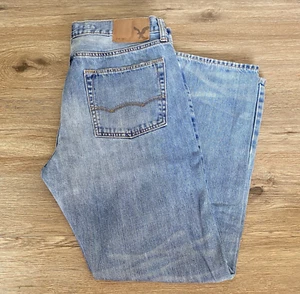 American Eagle Jeans Mens 33x30 Original Boot Cut Light Wash Faded Denim - Picture 1 of 12