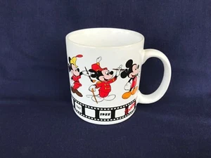 1 Disney Mickey Mouse Coffee Mug Cup Celebrating from 1928-Today Thru the Years - Picture 1 of 3