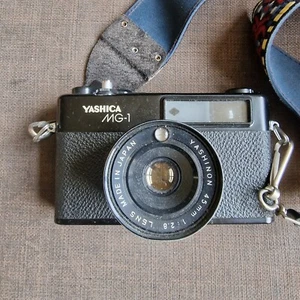 FOTOCAMERA VINTAGE YASHICA MG-1 35mm RANGEFINDER c.1975 funzionante ma leggere bene - Foto 1 di 6